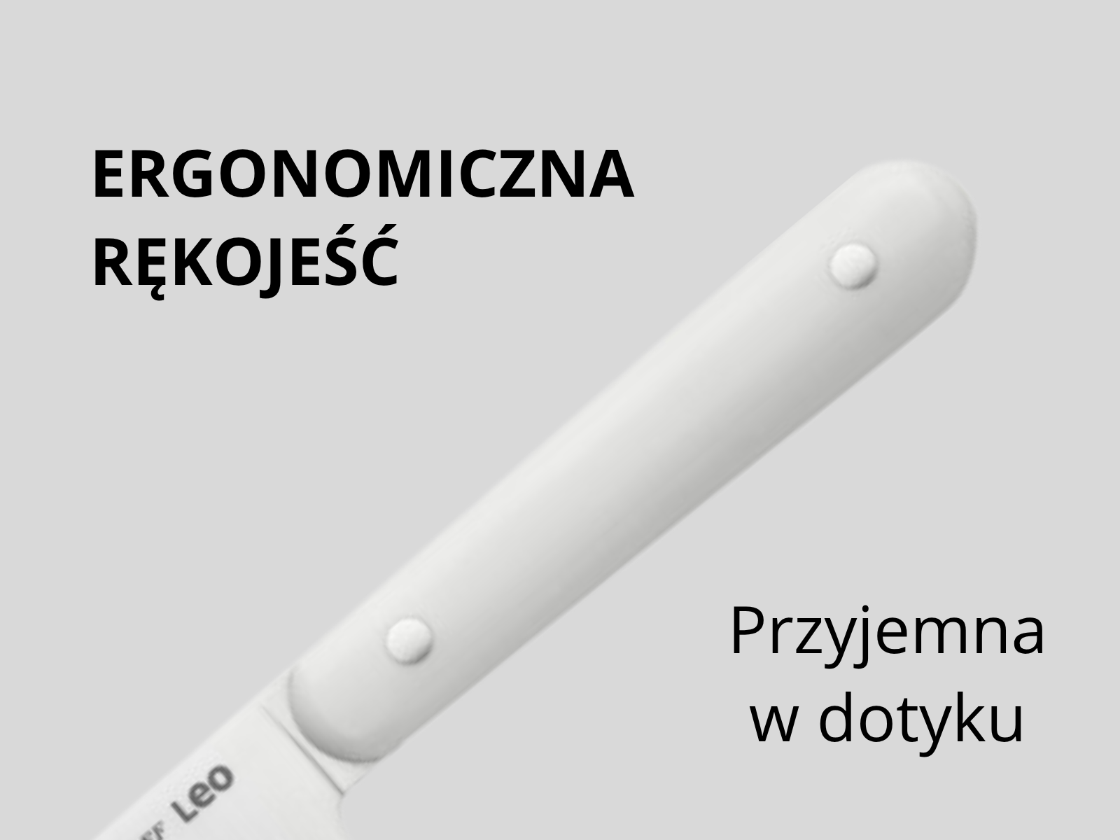 Biała rękojeść noża z napisami: Ergonomiczna rękojeść, Przyjemna w dotyku.